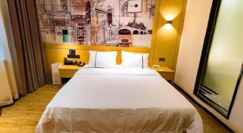 Bed in City Comfort Inn Meishan Wanda Plaza