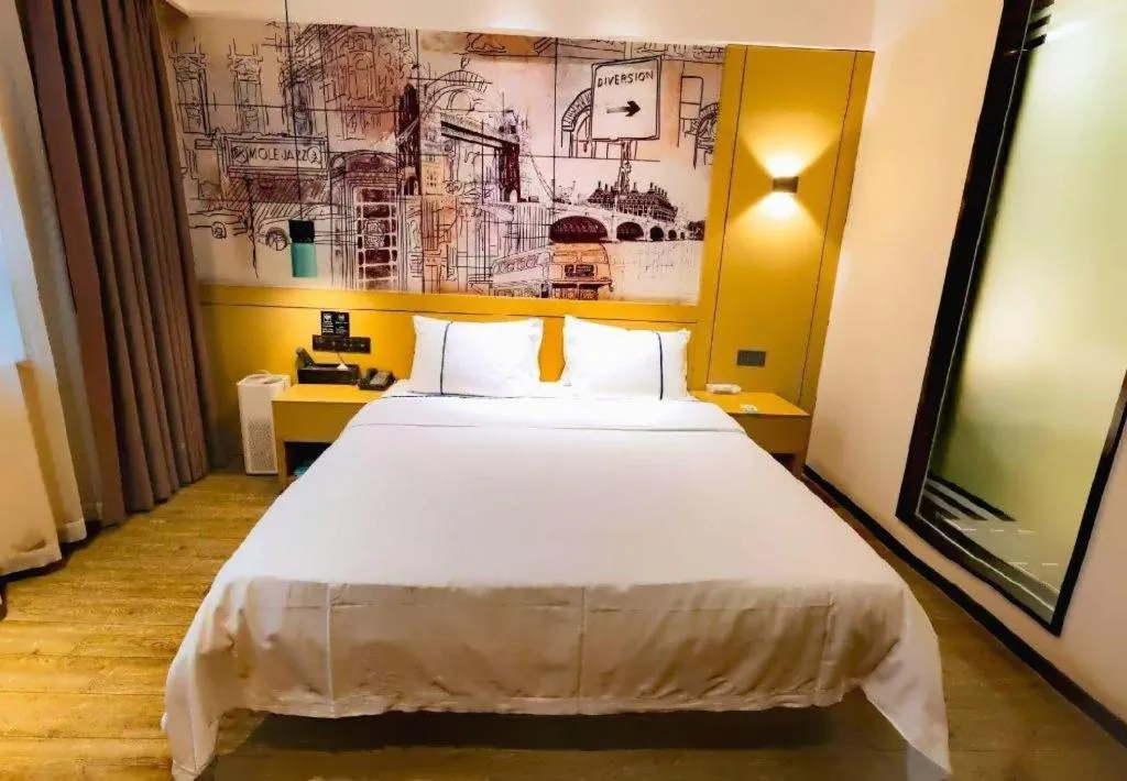 Bed in City Comfort Inn Meishan Wanda Plaza