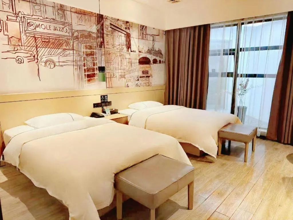 Bed in City Comfort Inn Meishan Wanda Plaza