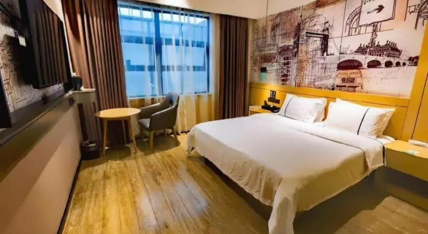 Bed in City Comfort Inn Meishan Wanda Plaza