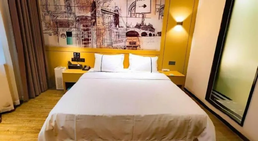Bed in City Comfort Inn Meishan Wanda Plaza