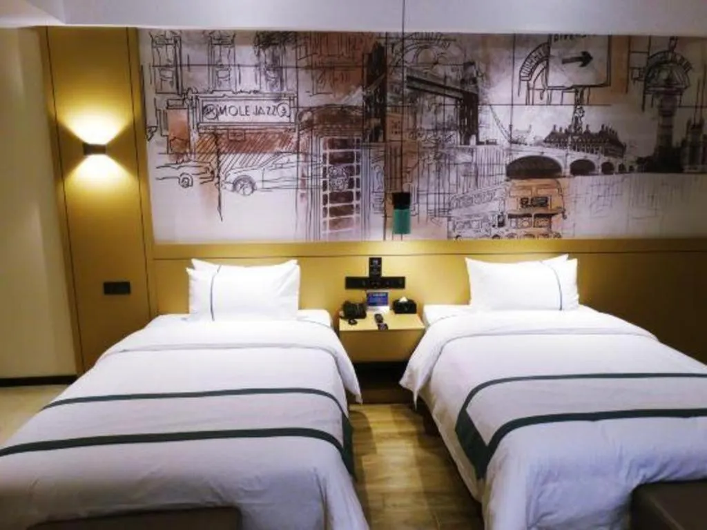 Bed in City Comfort Inn Meishan Wanda Plaza