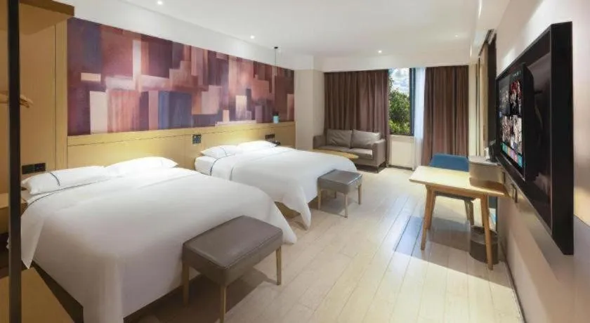 Bed in City Comfort Inn Meishan Wanda Plaza