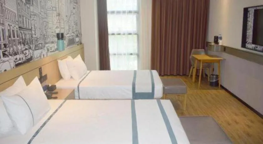 Bed in City Comfort Inn Meishan Wanda Plaza