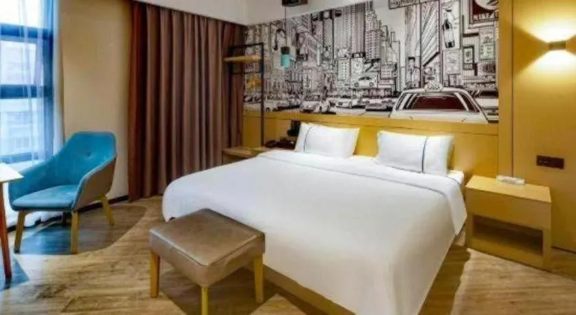 Bed in City Comfort Inn Meishan Wanda Plaza