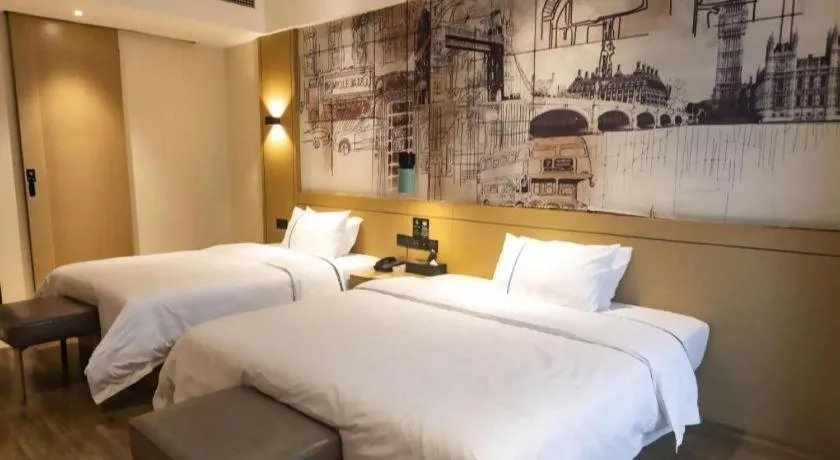 Bed in City Comfort Inn Meishan Wanda Plaza