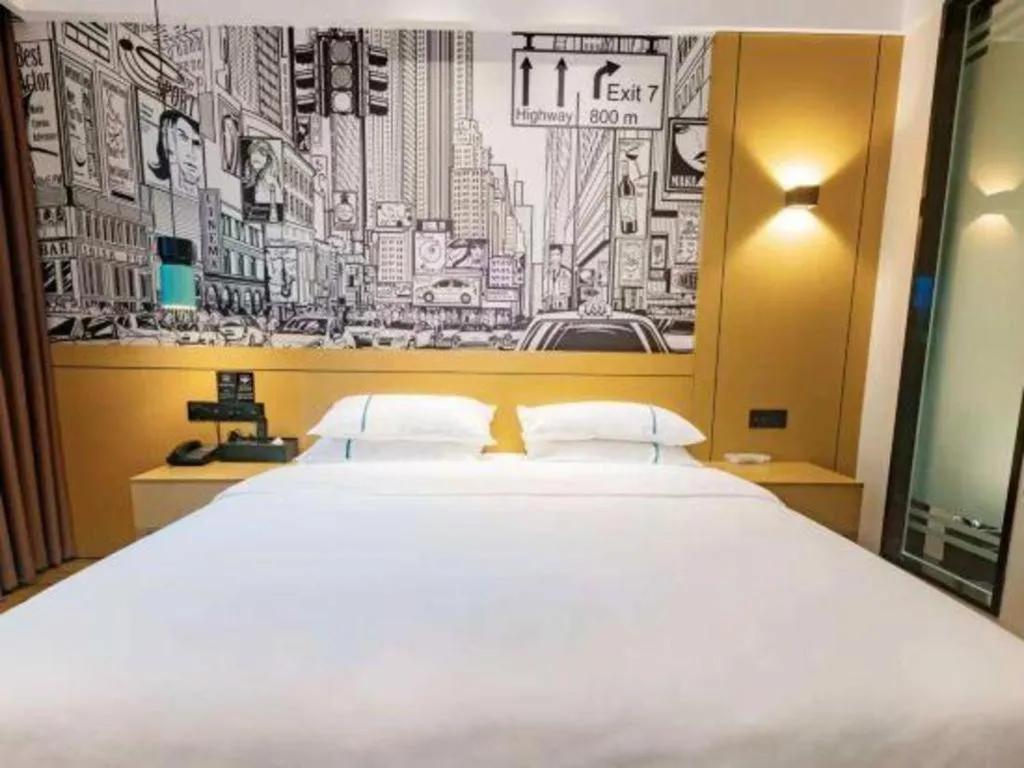 Bed in City Comfort Inn Meishan Wanda Plaza