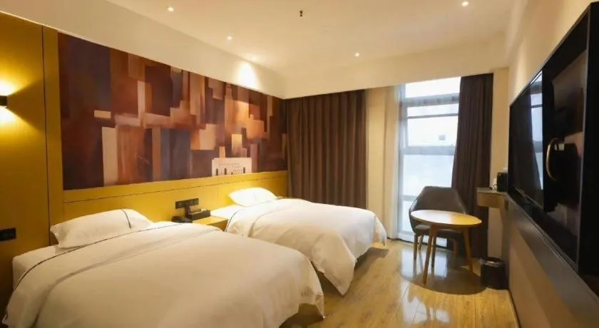 Bed in City Comfort Inn Meishan Wanda Plaza