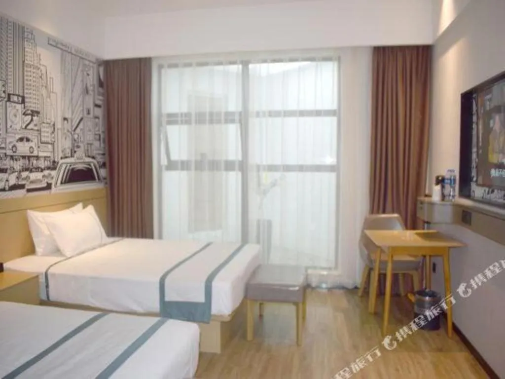 Bed in City Comfort Inn Meishan Wanda Plaza