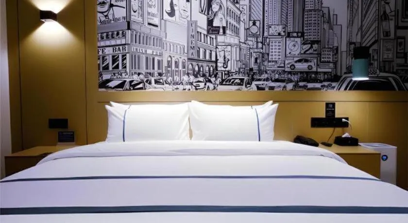 Bed in City Comfort Inn Meishan Wanda Plaza