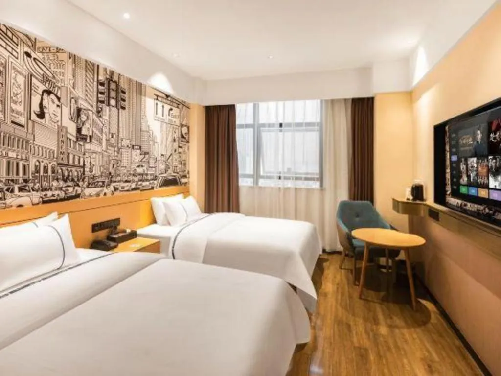 Bed in City Comfort Inn Meishan Wanda Plaza