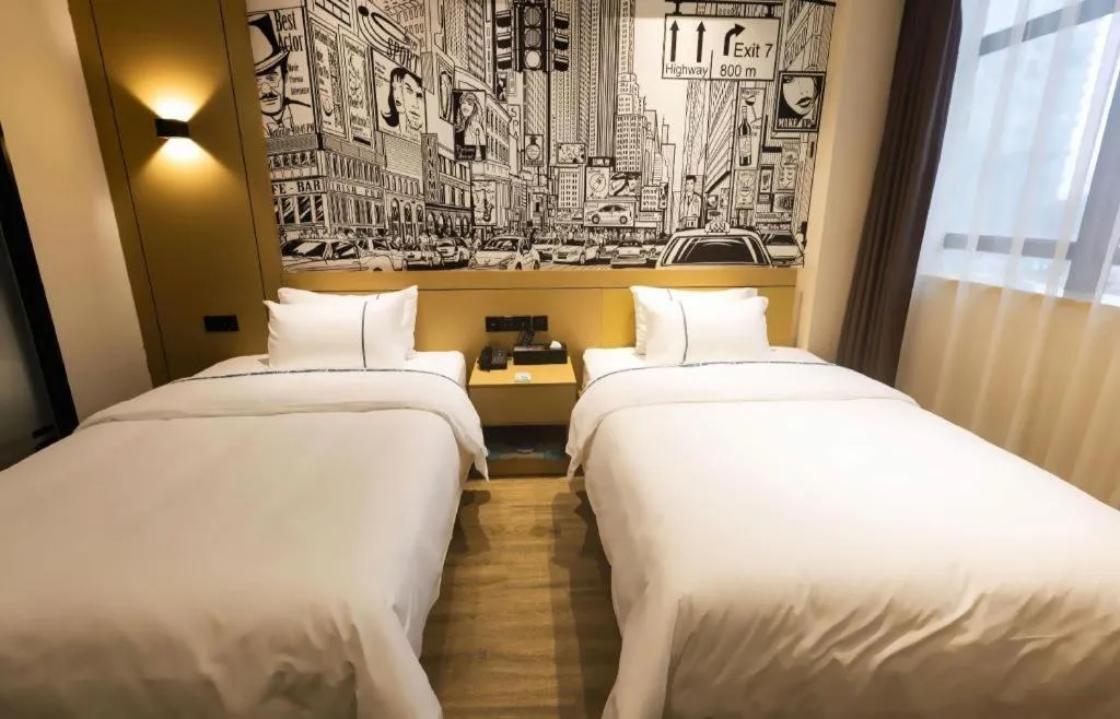 Bed in City Comfort Inn Meishan Wanda Plaza