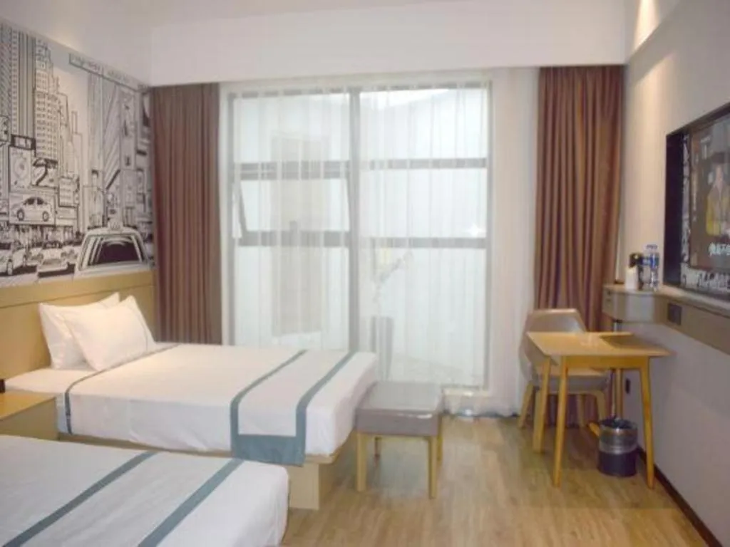 Bed in City Comfort Inn Meishan Wanda Plaza