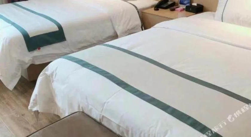 Bed in City Comfort Inn Meishan Wanda Plaza