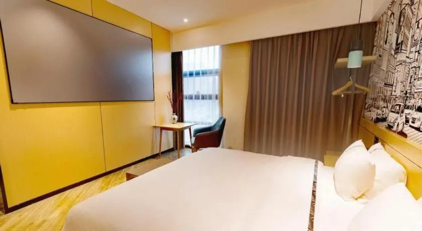 Bed in City Comfort Inn Meishan Wanda Plaza