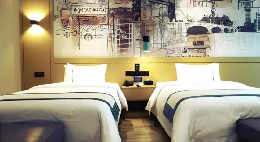 Bed in City Comfort Inn Meishan Wanda Plaza