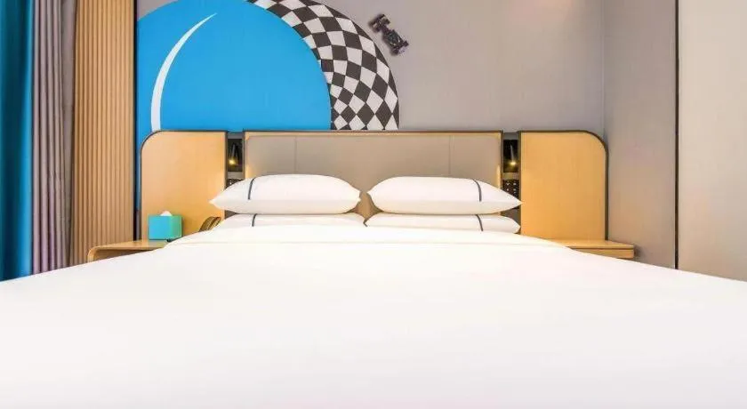 Bed in City Comfort Inn Guilin Jiatianxia Square International Conferences & Exhibition Center