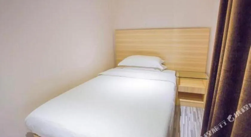 Bed in City Comfort Inn Hechi Bama Shouxiang Avenue