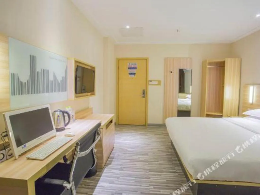 Bed in City Comfort Inn Hechi Bama Shouxiang Avenue