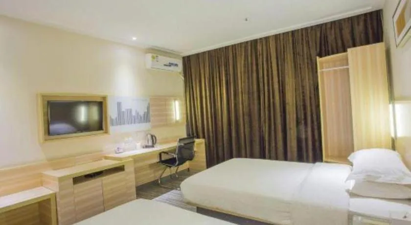 Bed in City Comfort Inn Hechi Bama Shouxiang Avenue