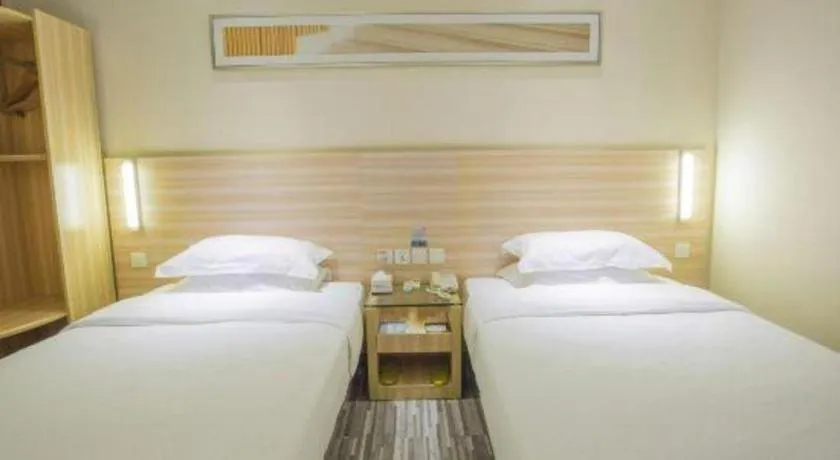 Bed in City Comfort Inn Hechi Bama Shouxiang Avenue