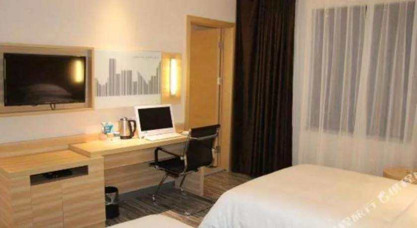 Bed in City Comfort Inn Hechi Bama Shouxiang Avenue