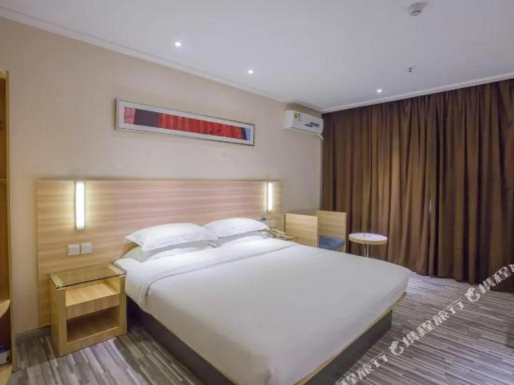 Bed in City Comfort Inn Hechi Bama Shouxiang Avenue