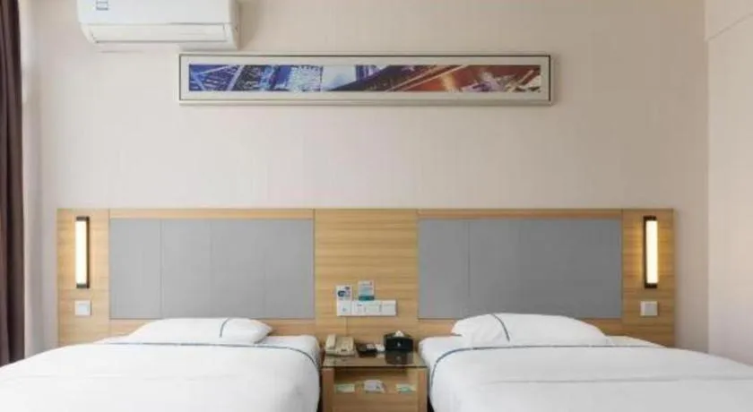 Bed in City Comfort Inn Hechi Bama Shouxiang Avenue