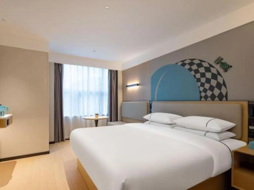 Bed in City Comfort Inn Hechi Bama Shouxiang Avenue