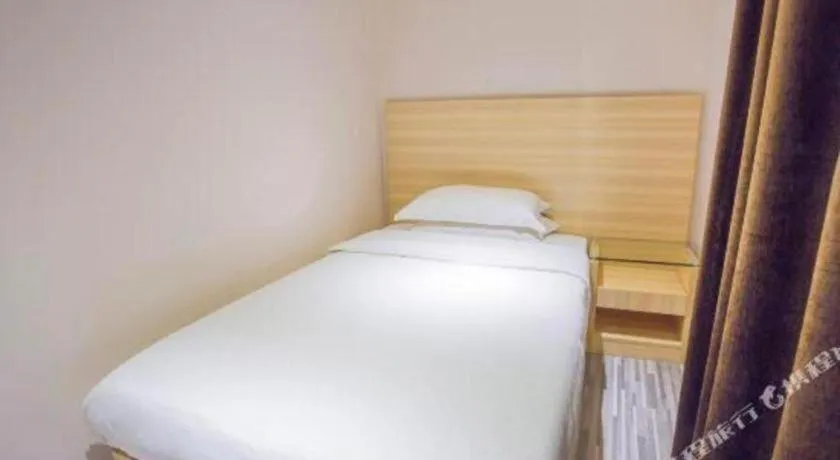 Bed in City Comfort Inn Hechi Bama Shouxiang Avenue