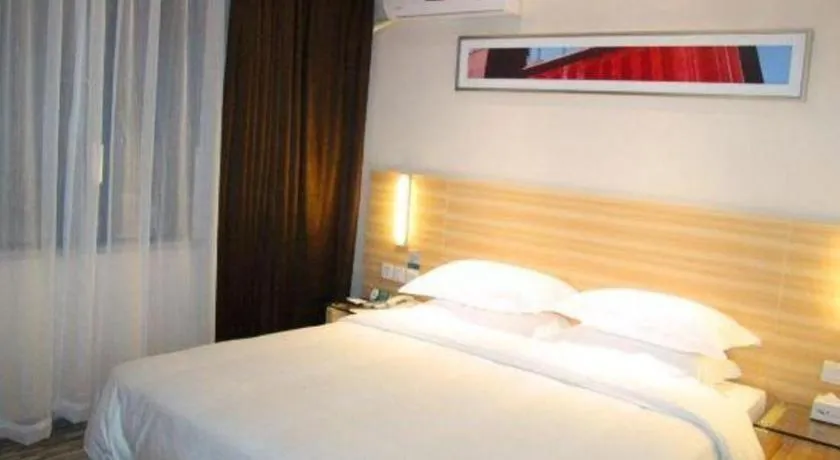 Bed in City Comfort Inn Hechi Bama Shouxiang Avenue