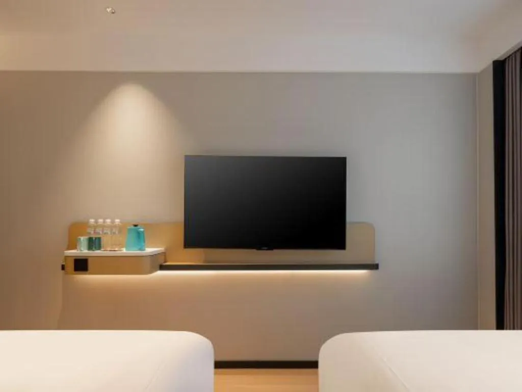 Bed in City Comfort Inn Hechi Bama Shouxiang Avenue