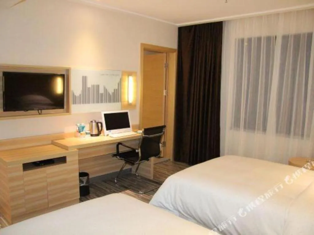 Bed in City Comfort Inn Hechi Bama Shouxiang Avenue