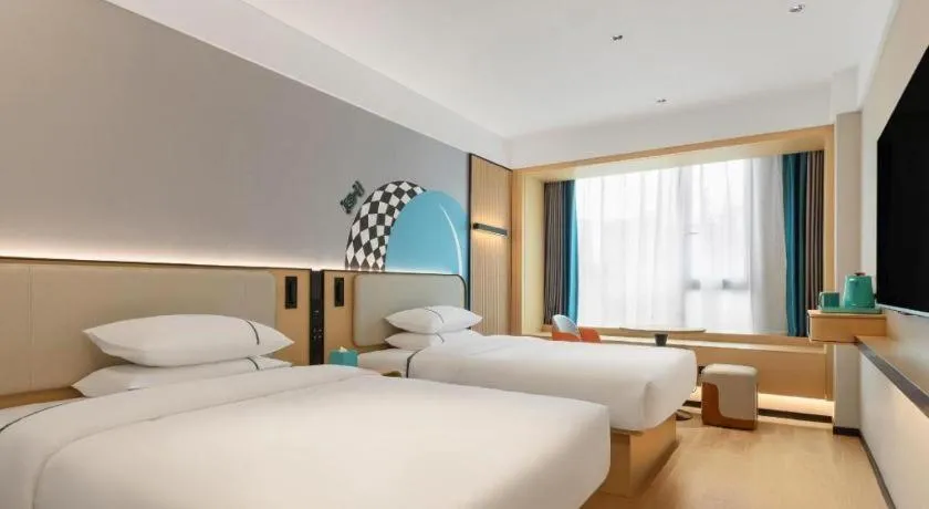 Bed in City Comfort Inn Chongzuo Youyi Avenue