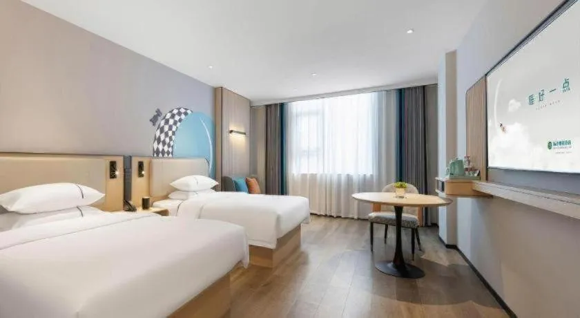 Bed in City Comfort Inn Chongzuo Youyi Avenue