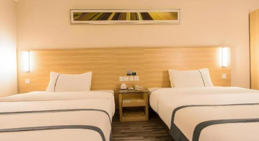 Bed in City Comfort Inn Chongzuo Youyi Avenue