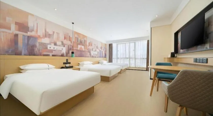 Bed in City Comfort Inn Nanning International Exhibition Jinhu Plaza