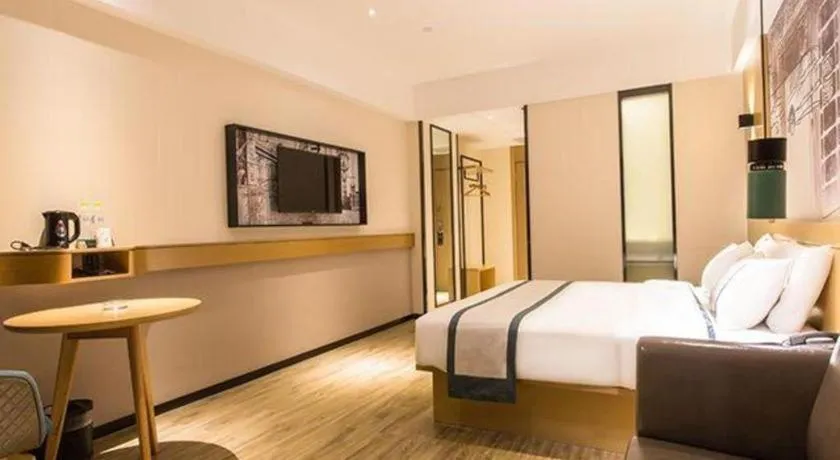 Bed in City Comfort Inn Nanning International Exhibition Jinhu Plaza