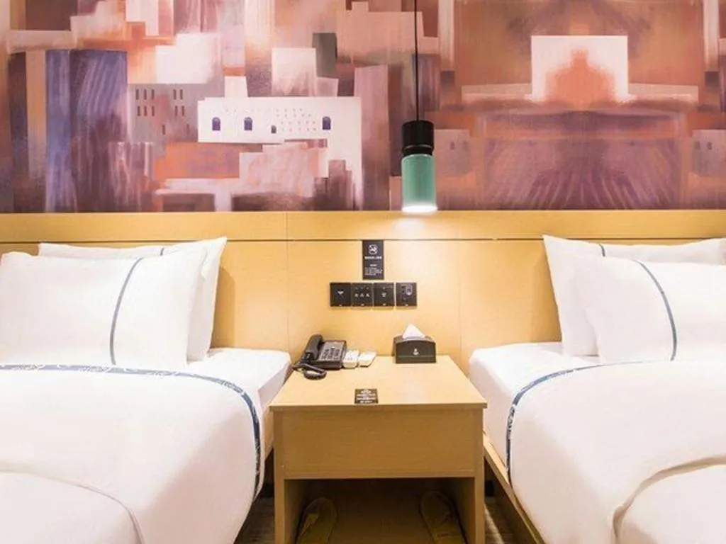 Bed in City Comfort Inn Nanning International Exhibition Jinhu Plaza