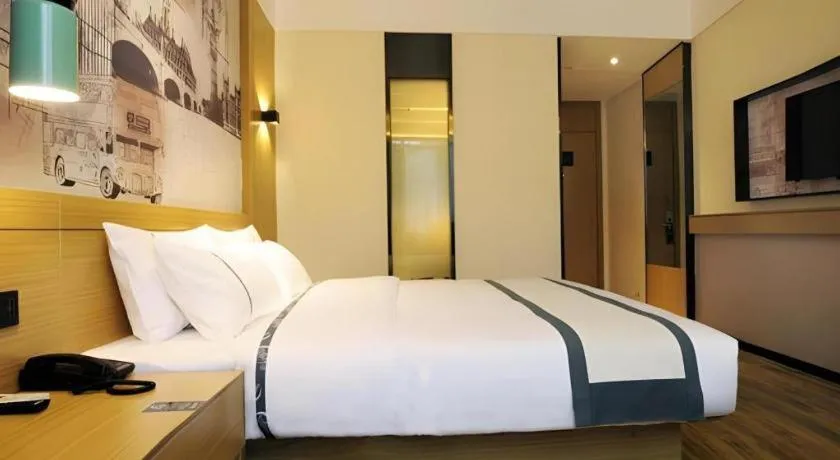 Bed in City Comfort Inn Suizhou Bingzi Wanda