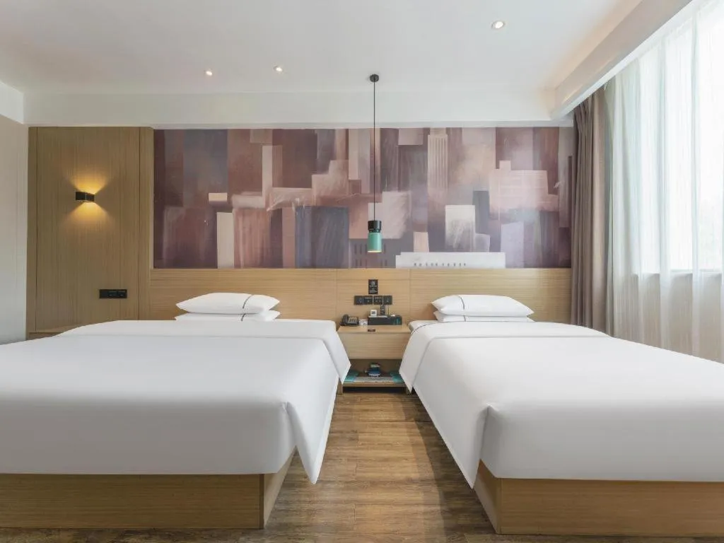 Bed in City Comfort Inn Suizhou Bingzi Wanda