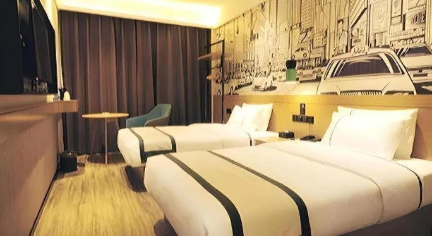 Bed in City Comfort Inn Suizhou Bingzi Wanda