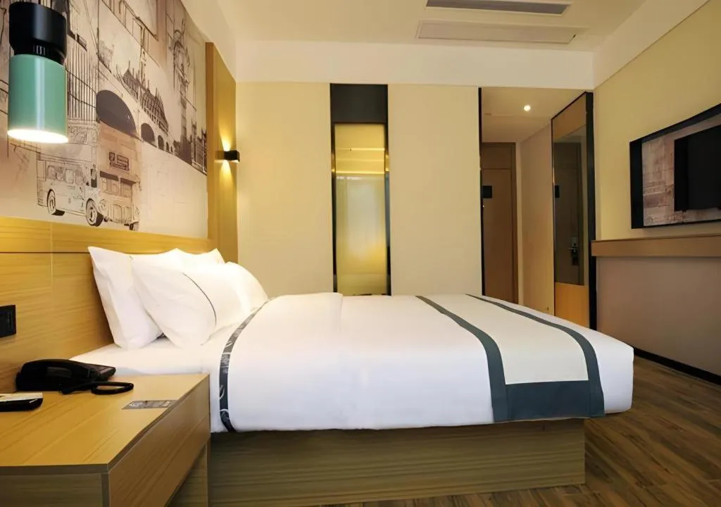 Bed in City Comfort Inn Suizhou Bingzi Wanda