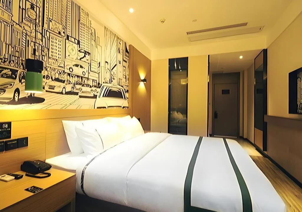 Bed in City Comfort Inn Suizhou Bingzi Wanda