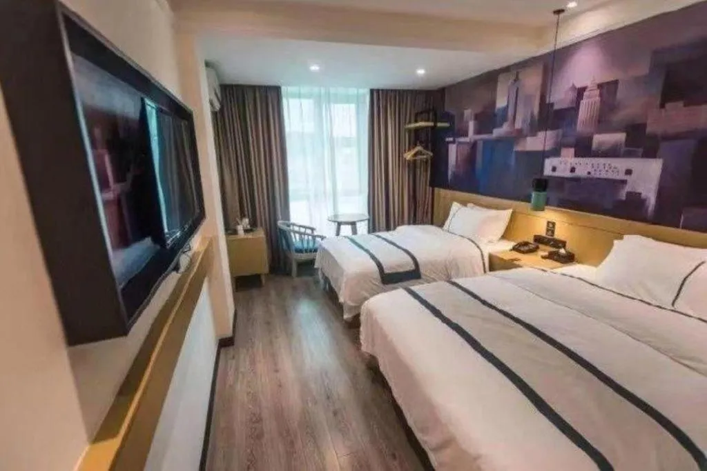 Bed in City Comfort Inn Shaoguan High-speed Railway Station Xilian Examination Center