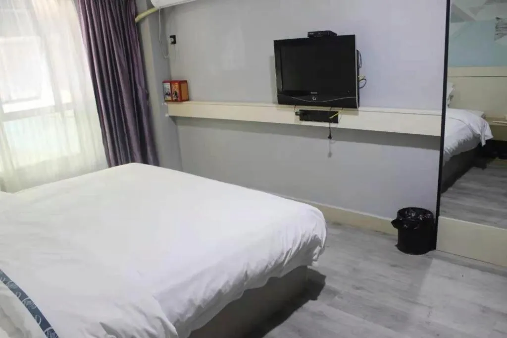 Bed in City Comfort Inn Shaoguan High-speed Railway Station Xilian Examination Center