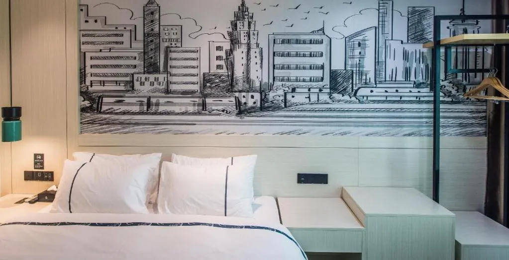 Bed in City Comfort Inn Shaoguan High-speed Railway Station Xilian Examination Center