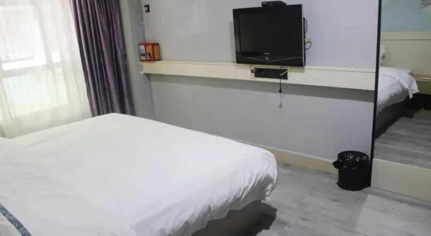 Bed in City Comfort Inn Shaoguan High-speed Railway Station Xilian Examination Center