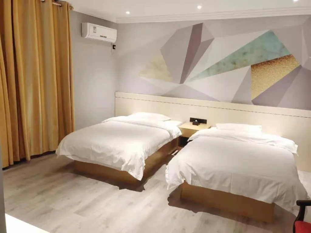 Bed in City Comfort Inn Shaoguan High-speed Railway Station Xilian Examination Center