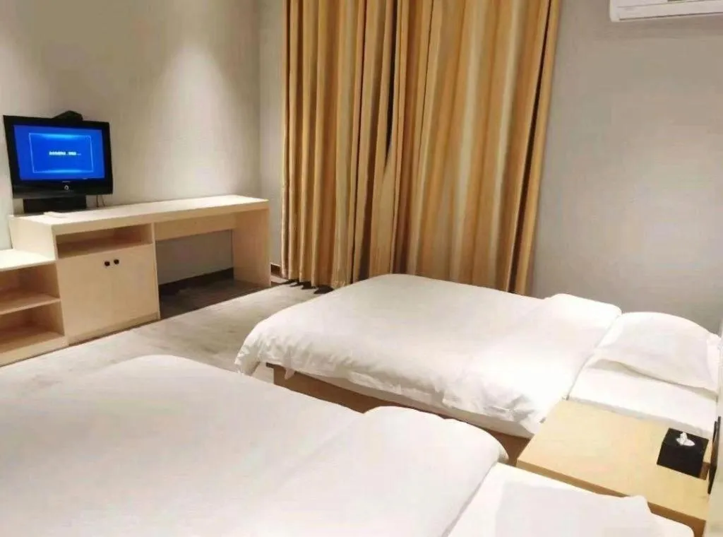 Bed in City Comfort Inn Shaoguan High-speed Railway Station Xilian Examination Center